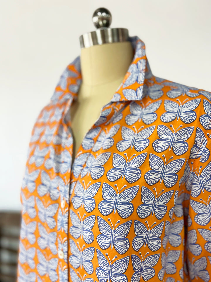 close up saffron and blue artisan shirt with butterfly print by sigrid olsen 