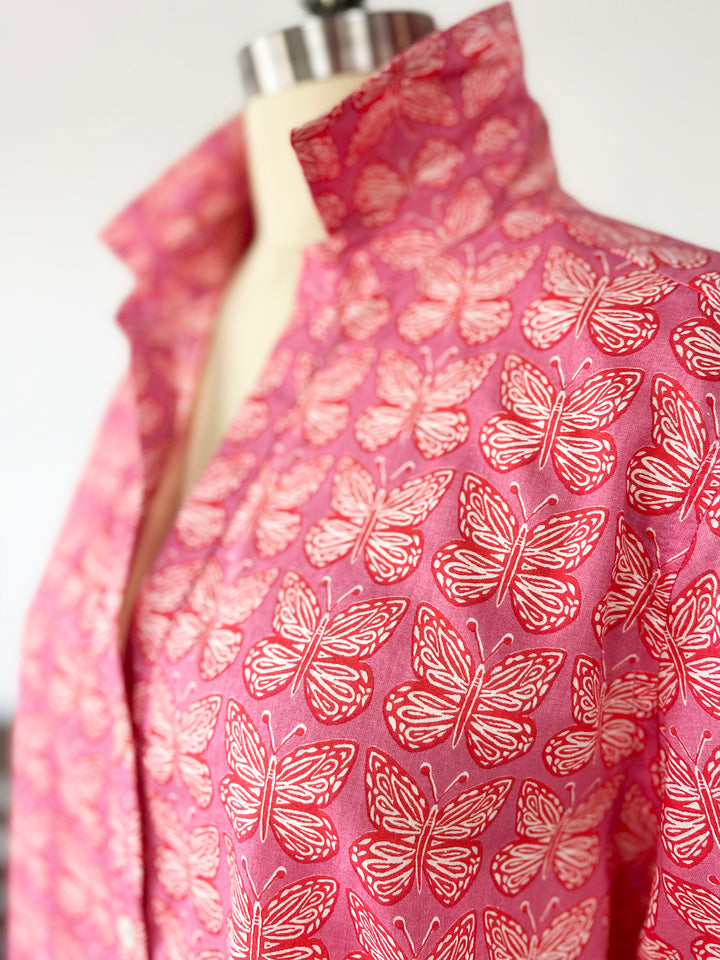 close up of artisan shirt with butterfly print