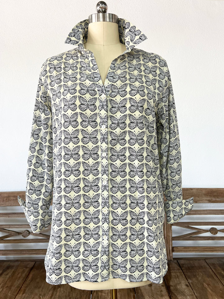 woman in artisan shirt with butterfly print