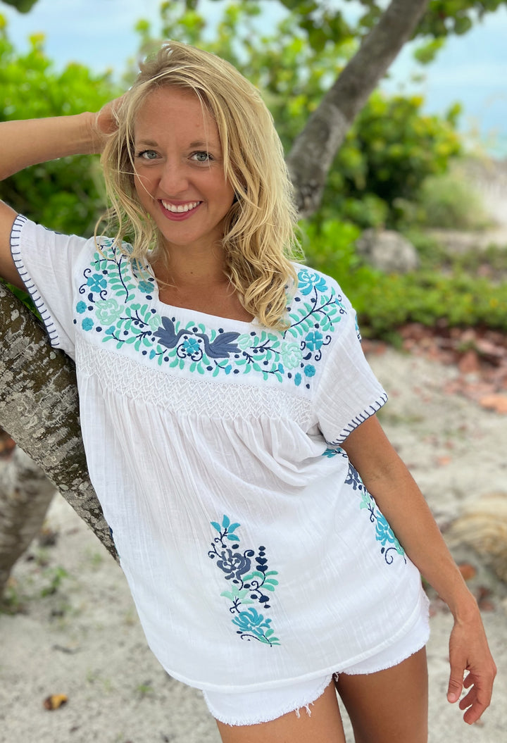 woman in embroidered 100% cotton white luisa shirt by sigrid olsen 