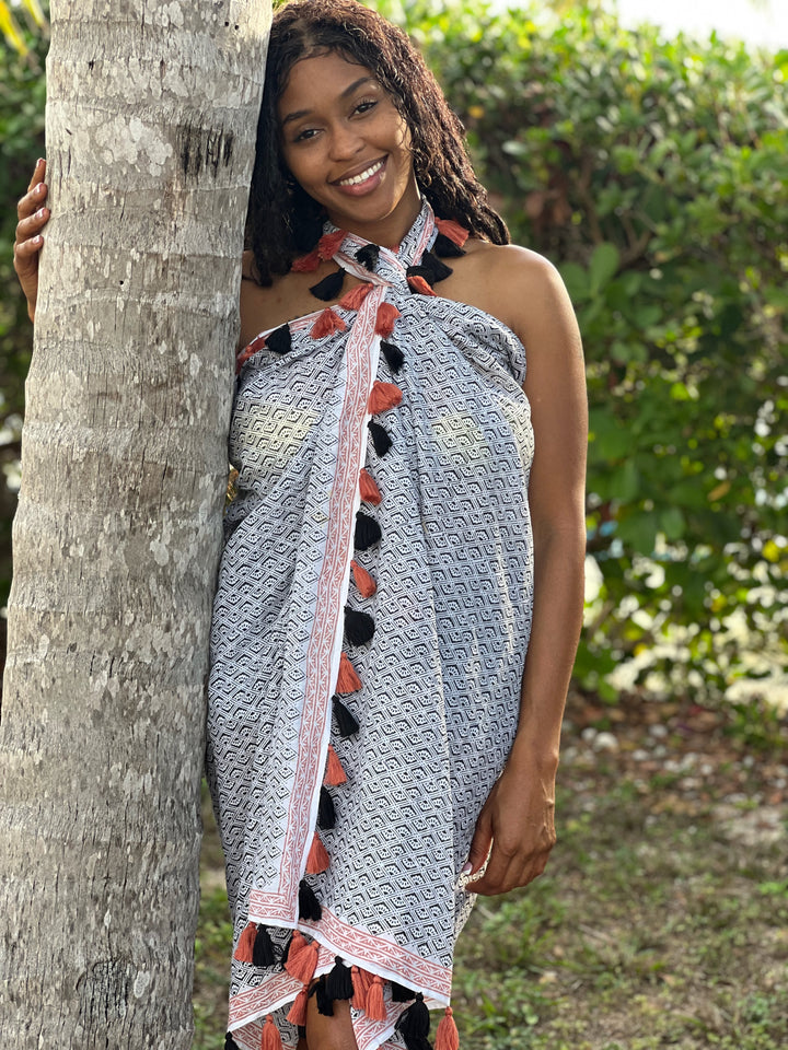 woman in lightweight cotton tassel shawl