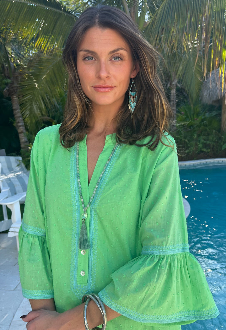 woman in 100% cotton green blouse by sigrid olsen 