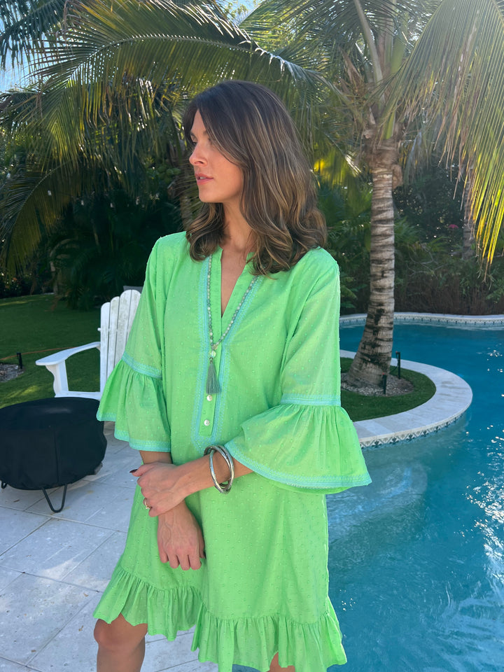 woman in soft green cotton dress.jpg