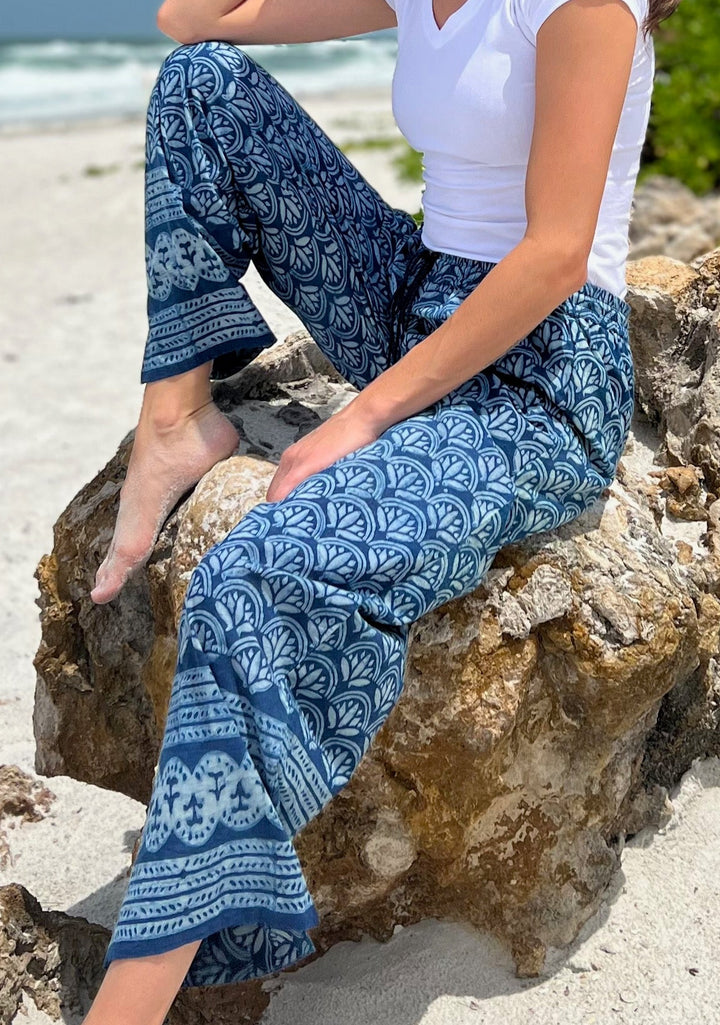 woman in printed drawstring pants on the beach
