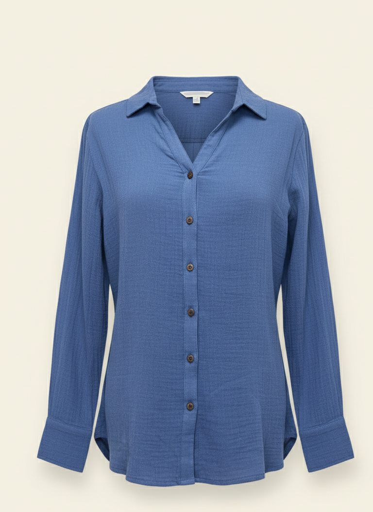 Blue button-up shirt on a beige background