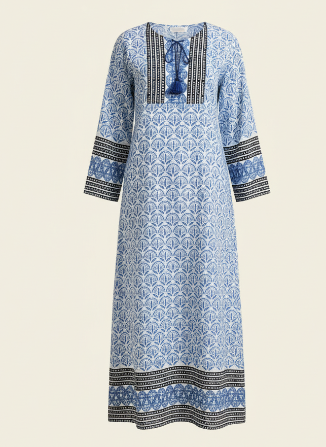 Blue patterned dress with black accents on a beige background