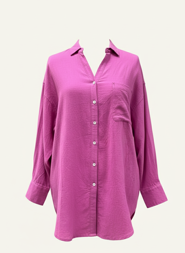 Pink button-up shirt on a light pink background