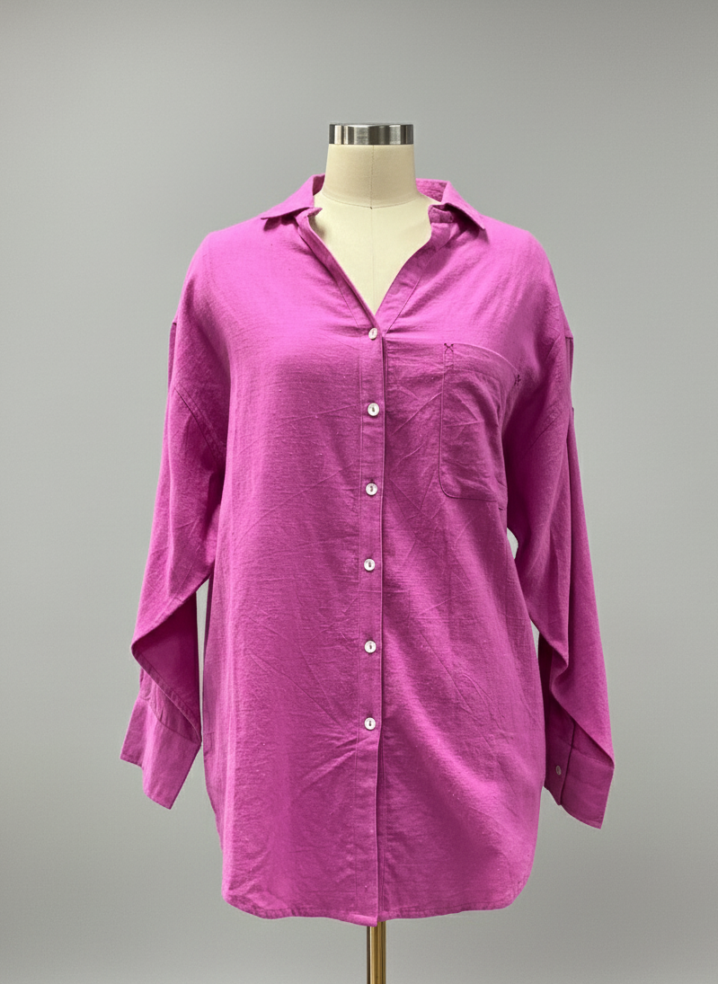 Purple shirt on a mannequin against a gray background
