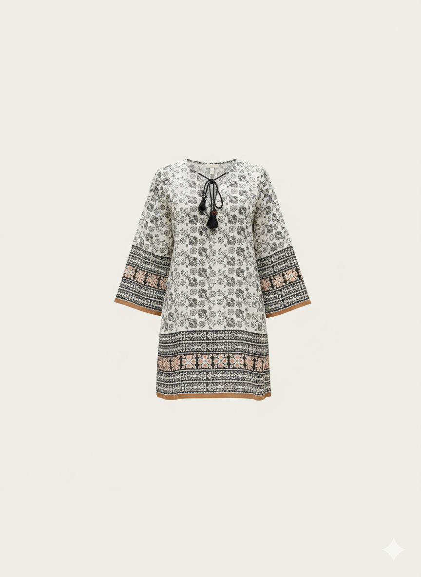 Floral patterned dress with long sleeves on a white background