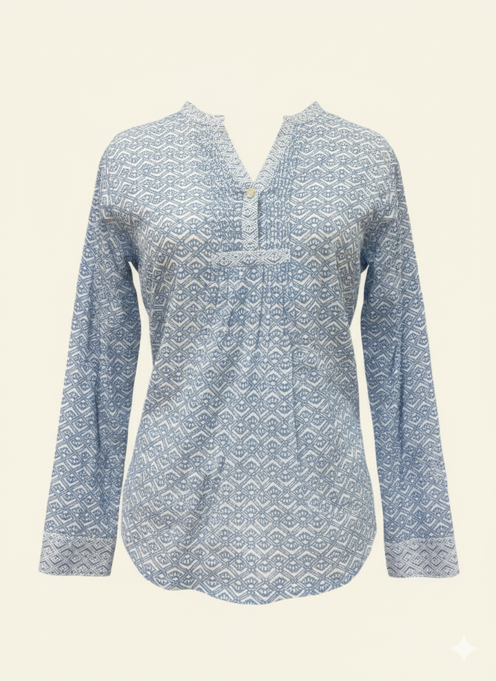 Blue patterned blouse on a beige background