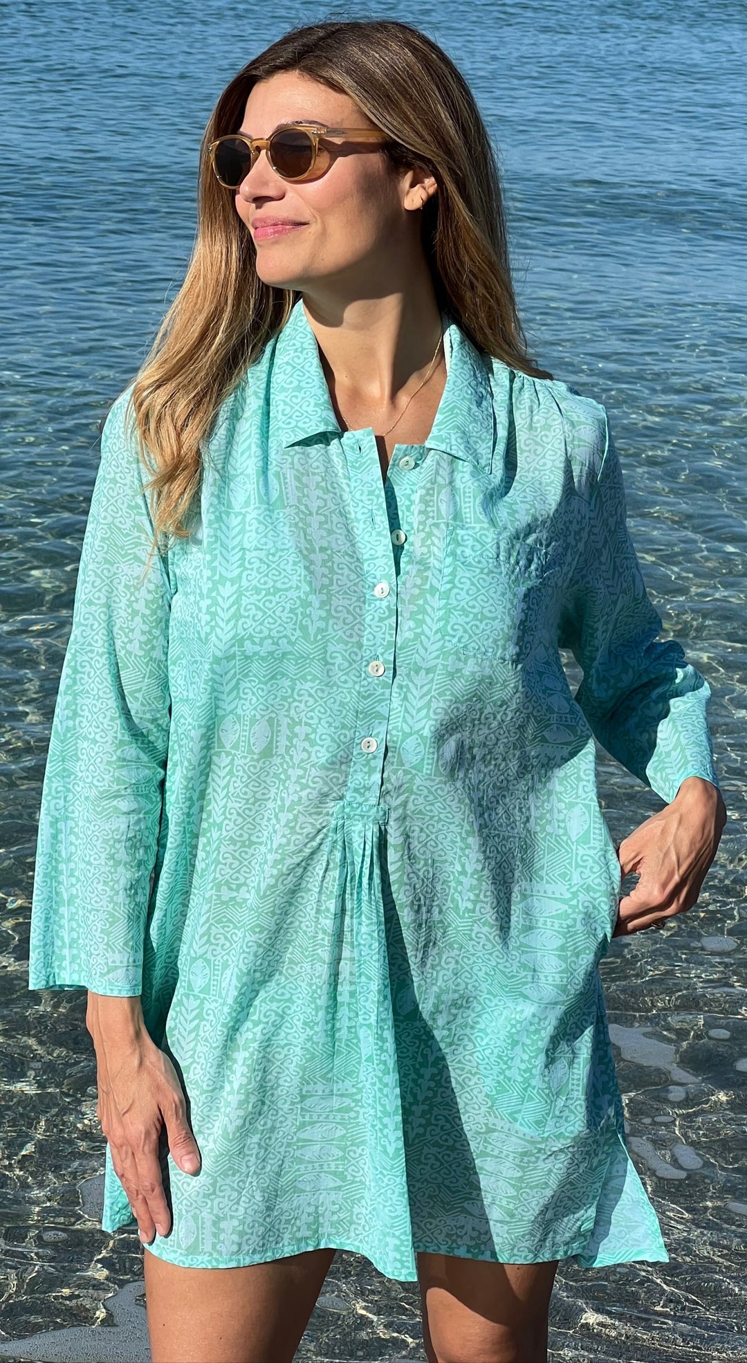 woman in dress or cover up style hand carved printed top 