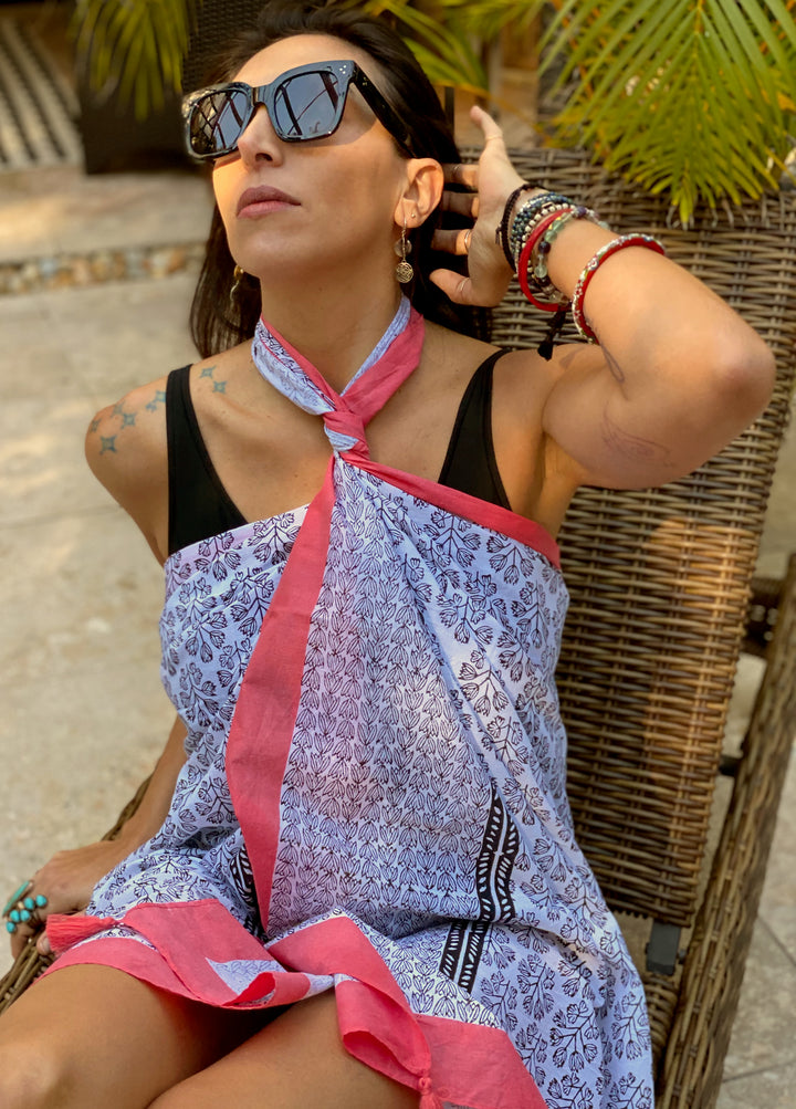 close up of beach wrap and cover up with print in blue and pink