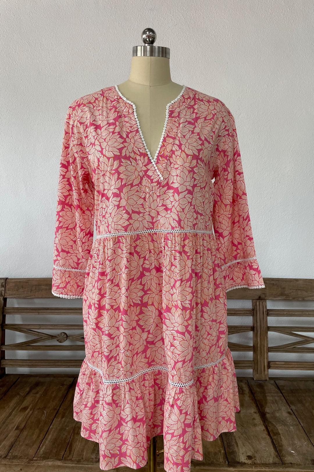 Woman in pink Morrea dress with floral print.jpg