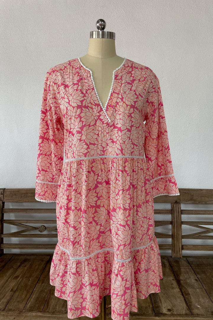 Woman in pink Morrea dress with floral print.jpg