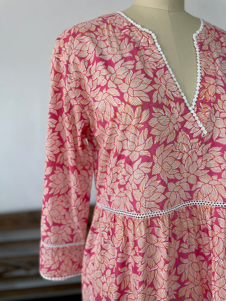 Woman in pink Morrea dress with floral print.jpg