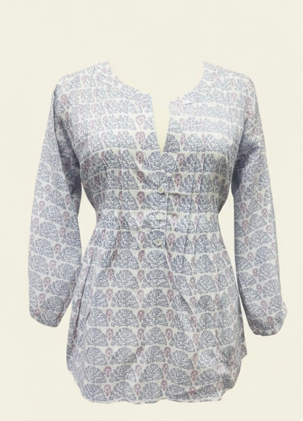 White blouse with blue floral pattern on a white background