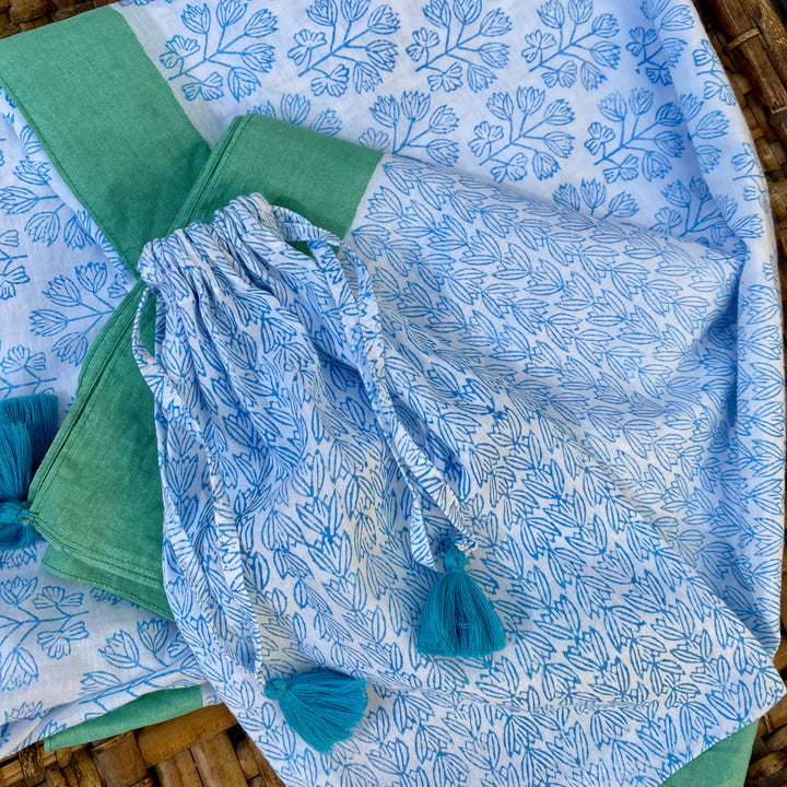 close up of beach cover up with hand carved and printed pattern jpg