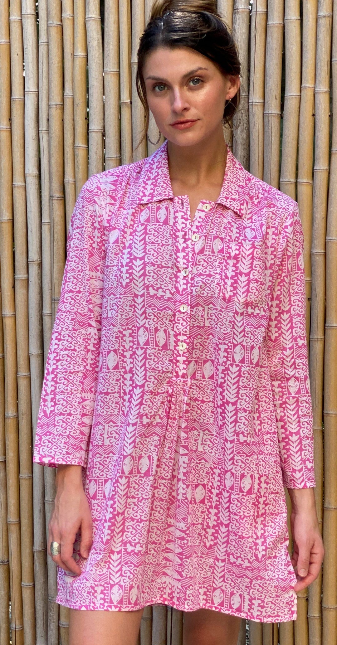 woman in dress or cover up style hand carved printed top 